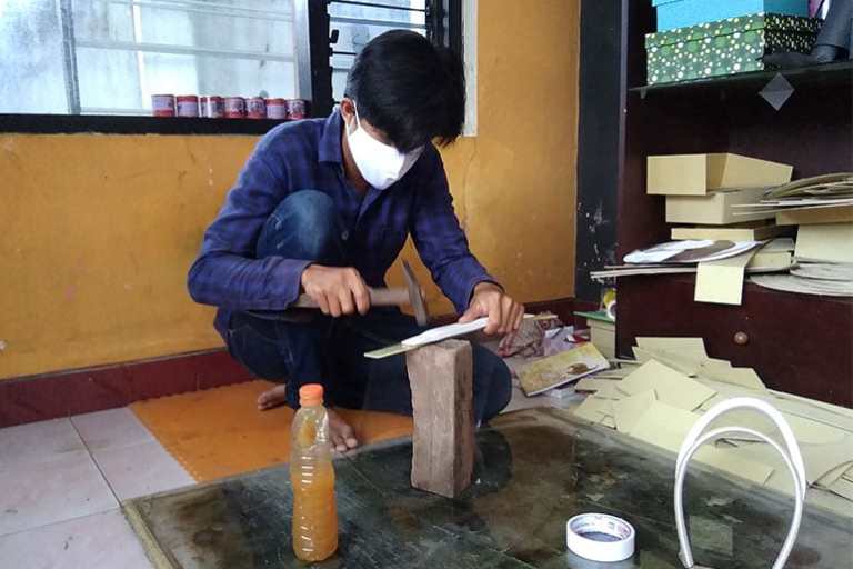 Photo of Hascaryo making face shields
