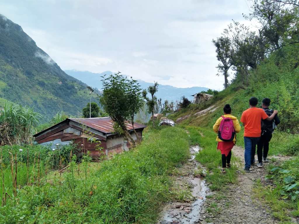 CBM’s field partners walking to visit people with disabilities and their families.