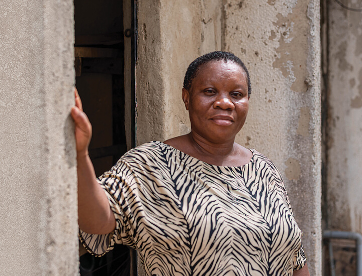 Chizoram holding a pillar