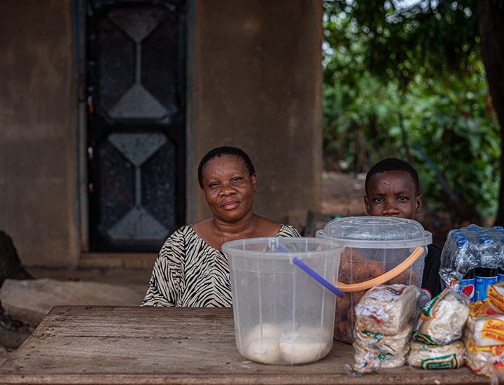 Chizoram holding a pillar
