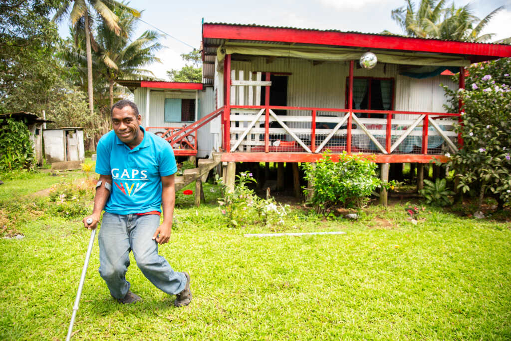 Isireli Kotoisuva, outside his family home.