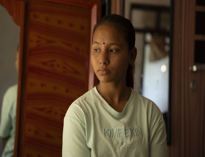 Dilmaya looking away from the camera