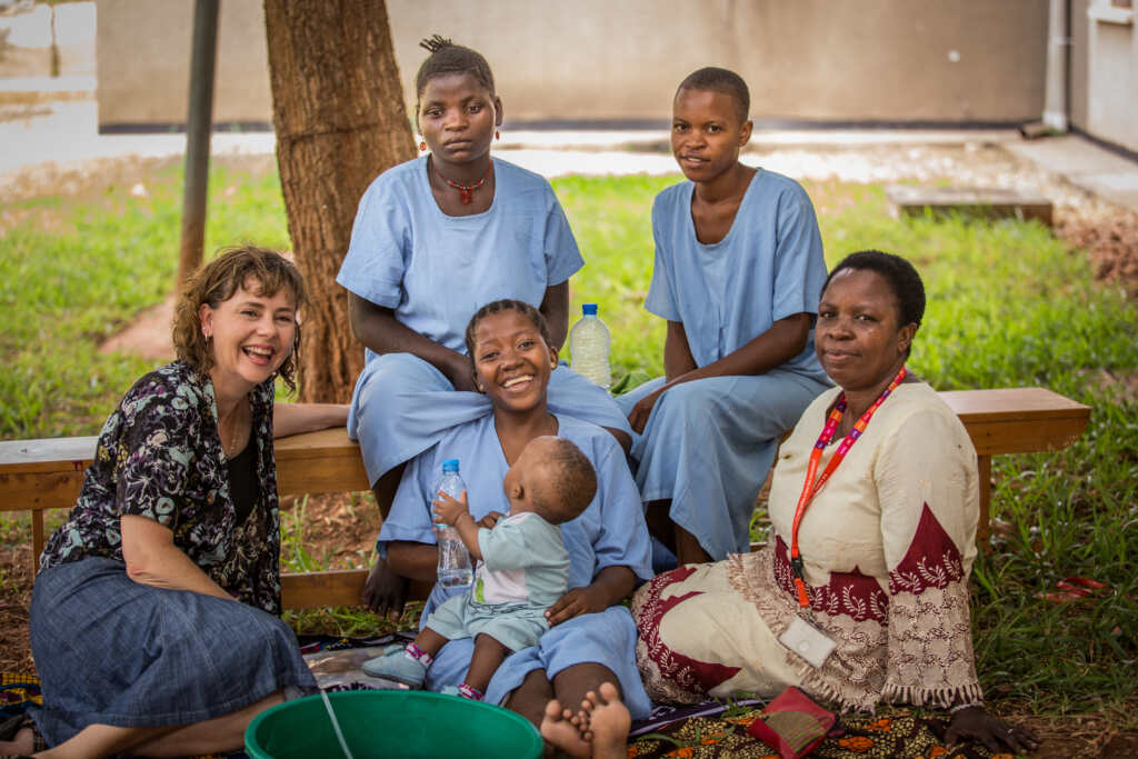 Lynda Wake speaking with the woman at CCBRT. Dar Es Salaam, Tanzania 2015. Photo by Erin Johnson, Room3 for CBM Australia.
