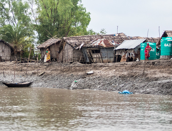 An image of a river and village after disastrous flooding